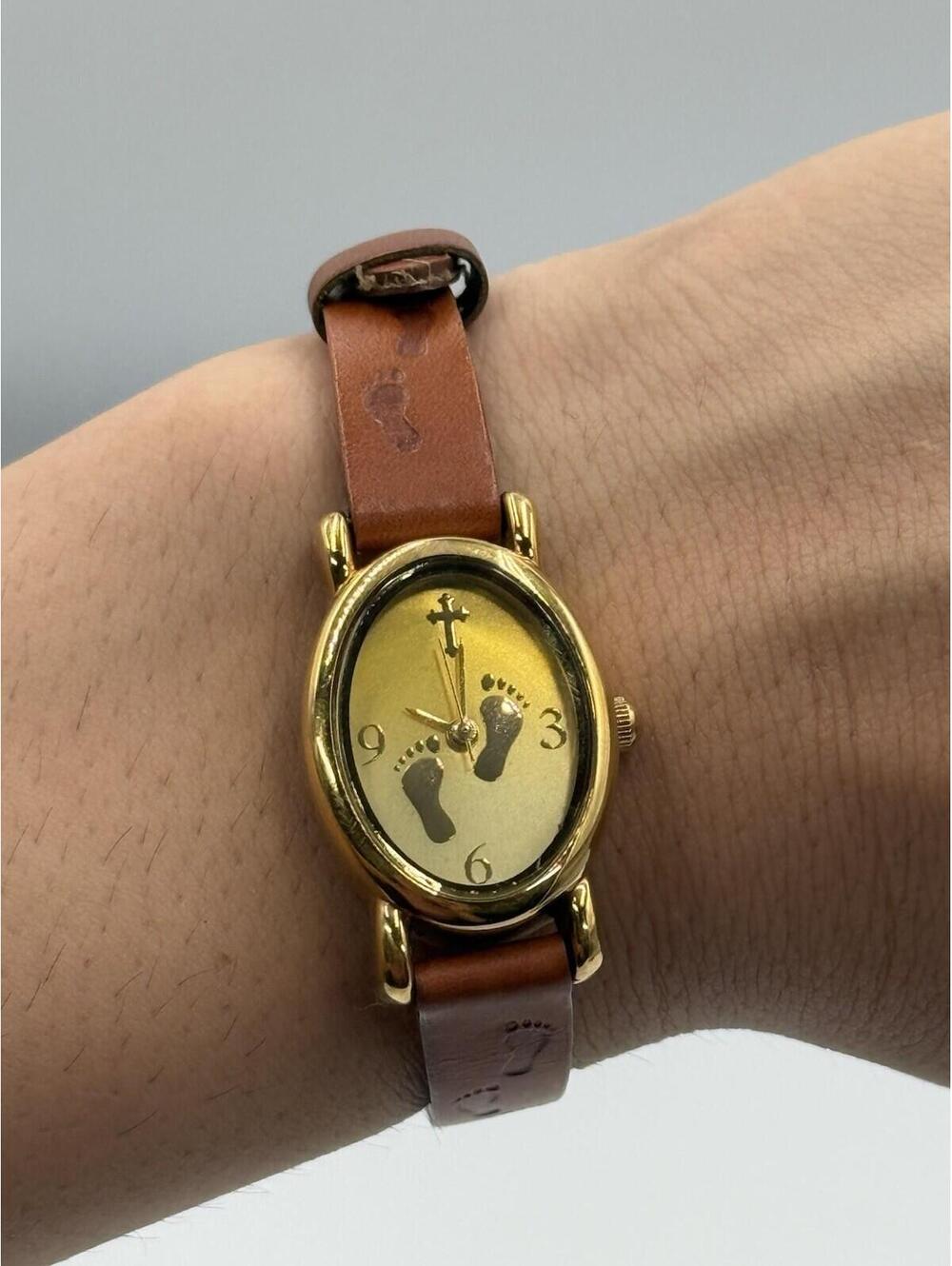 Footprints In The Sand Gold Tone Women’s Quartz Watch